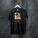 Black oversized unisex t-shirt featuring a graphic from the movie Veer Zaara with music player controls.