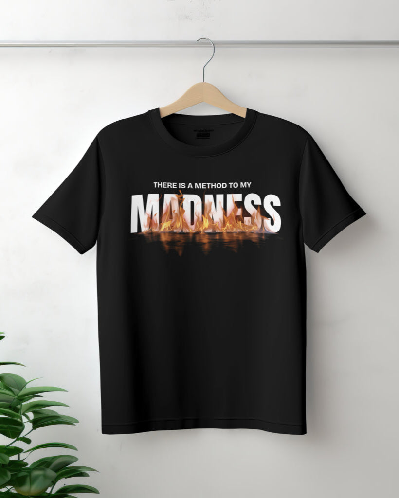 'There is a method to my madness' black t-shirt on a hanger