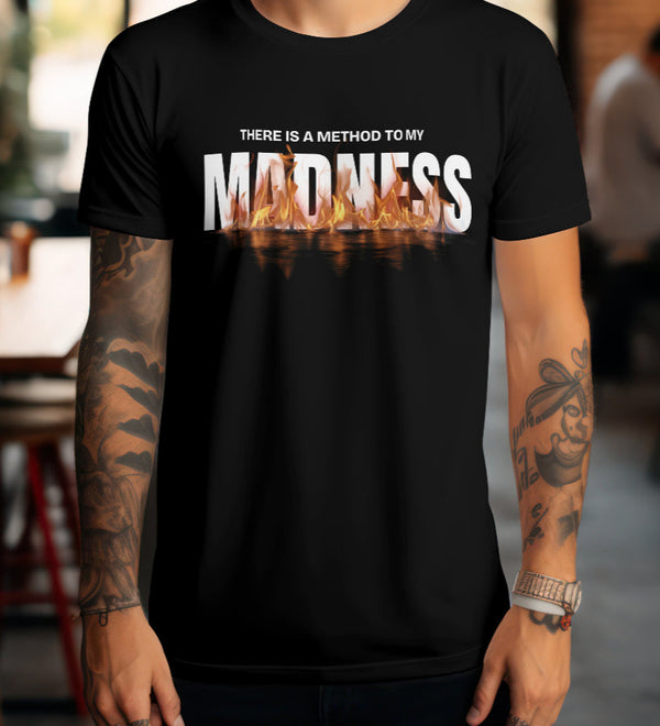 Black t-shirt with "There Is A Method To My Madness" text and fiery graphic on the front.