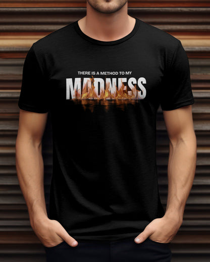 A model with his hands in his pocket wearing 'There is a method to my madness' black t-shirt.