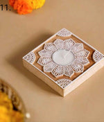Handcrafted wooden carved tealight holder with intricate floral design, perfect for Diwali or as a gift.