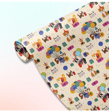 Cream gift wrap featuring a repeating pattern of dogs in party hats and balloons.