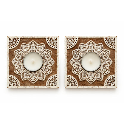 Blue Honey set of 2 wooden mandala block print tealight holders with tealights, on a white background