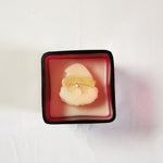 Christmas Candle Collection red glass jar bundle featuring a festive Santa Claus design on the candle.