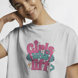 White crop top with 'Girls Who Lift' graphic featuring dumbbells and a kettlebell, front view.