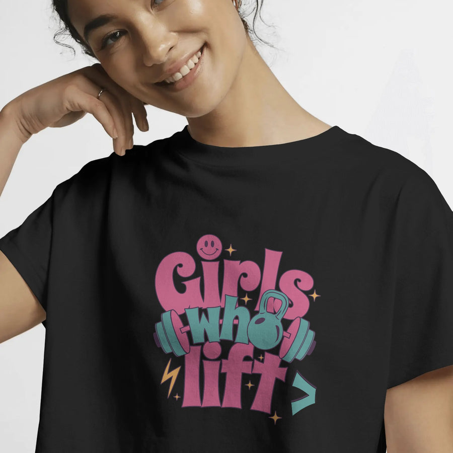 Black crop top with 'Girls Who Lift' graphic featuring dumbbells and a kettlebell, front view.