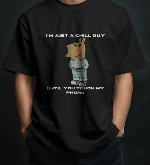 Men's black cotton graphic tee with 'I'm Just a Chill Guy... Until You Touch My Phone' quote and cartoon print.
