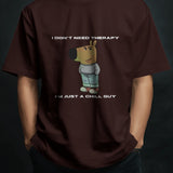 Brown "I Don't Need Therapy" Chill Guy graphic t-shirt for men, featuring a cartoon dog and text.