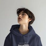 Front view of a navy blue Perfectly Imperfect heavyweight oversized hoodie with minimalist typography logo.
