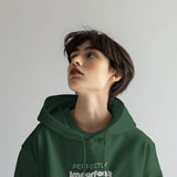 Front view of a green Perfectly Imperfect oversized hooded sweatshirt with minimalist typography.
