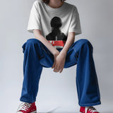Oversized white Diljit Dosanjh 'Diluminati' graphic t-shirt with a cosmic and mysterious design.