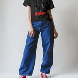 Oversized black graphic t-shirt featuring Diljit Dosanjh's Dil-Luminati design, worn by a person.
