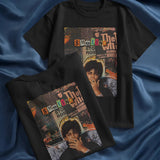 Black t-shirt with a collage graphic featuring the word "SMOKING" and a portrait of a man smoking.