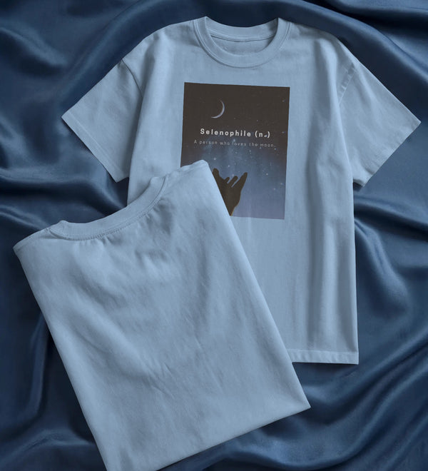 Minimalist Unisex Oversized T-shirt in white cotton featuring a 'Selenophile' graphic with a moon and definition.