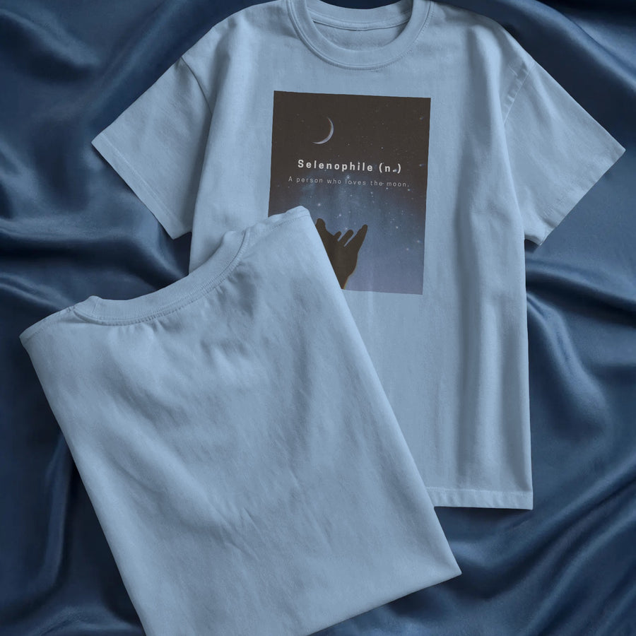 Minimalist Unisex Oversized T-shirt in white cotton featuring a 'Selenophile' graphic with a moon and definition.