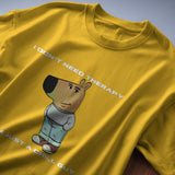 Yellow graphic t-shirt with "I Don't Need Therapy" and a chill dog character, front view.