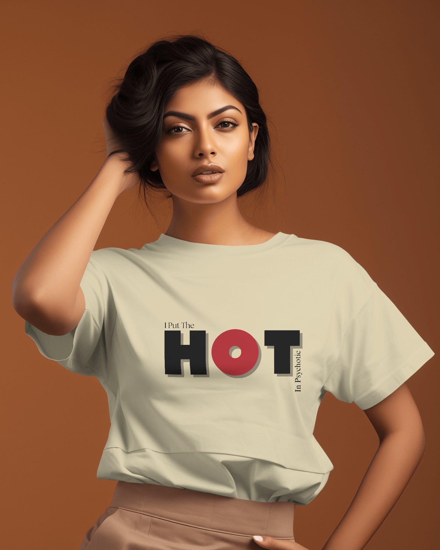 an Indian female model wearing beige classic half sleeve round neck I put the hot in psychotic graphic t-shirt. 