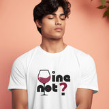 White "Wine Not?" t-shirt with a graphic of a wine glass and text, front view.