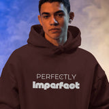 Front view of a maroon Perfectly Imperfect heavyweight oversized hooded sweatshirt with minimalist typography.
