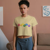 Front view of a woman wearing the Rainbow Bloom Crop Top, a fun and vibrantly stylish casual top.