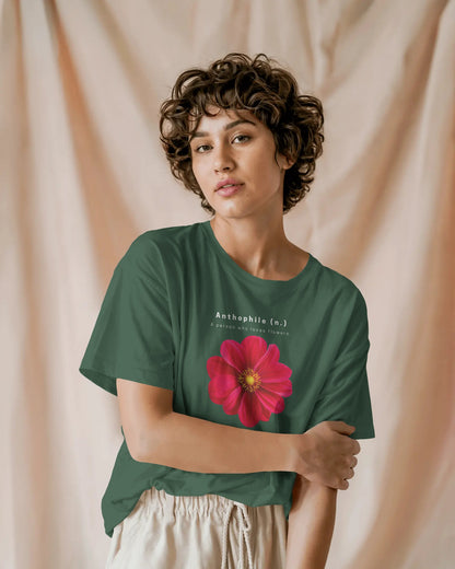 a female model standing wearing an oversized Bottle Green Anthophile tshirt 