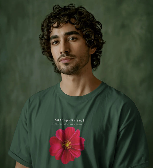 Green minimalist oversized unisex t-shirt with 'Anthophile' definition and a pink flower graphic.