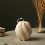 Eco-friendly 4" soy wax swirl pillar candle in a clean burn design, presented from a front view.