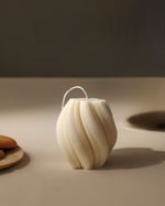 Eco-friendly 4" soy wax swirl pillar candle in a clean burn design, perfect for gifting.