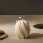 Eco-friendly 4" soy wax swirl pillar candle in a clean burn design, perfect for gifting.