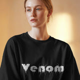 Venom Unisex Oversized Graphic Tee in black featuring a drip design, perfect for streetwear.