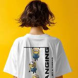 Back view of a white unisex t-shirt featuring Minions hanging by a thread with text that reads 'HANGING BY A THREAD'.