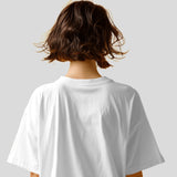Back view of an oversized white Diljit Dosanjh 'Diluminati' t-shirt, showcasing its relaxed fit and unique graphic design.